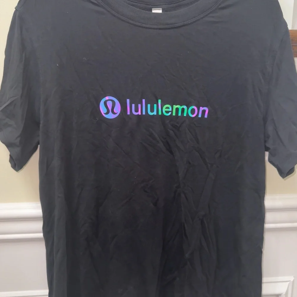 lululemon athletica Black Tee with Multicolor Logo - Picture 1 of 2